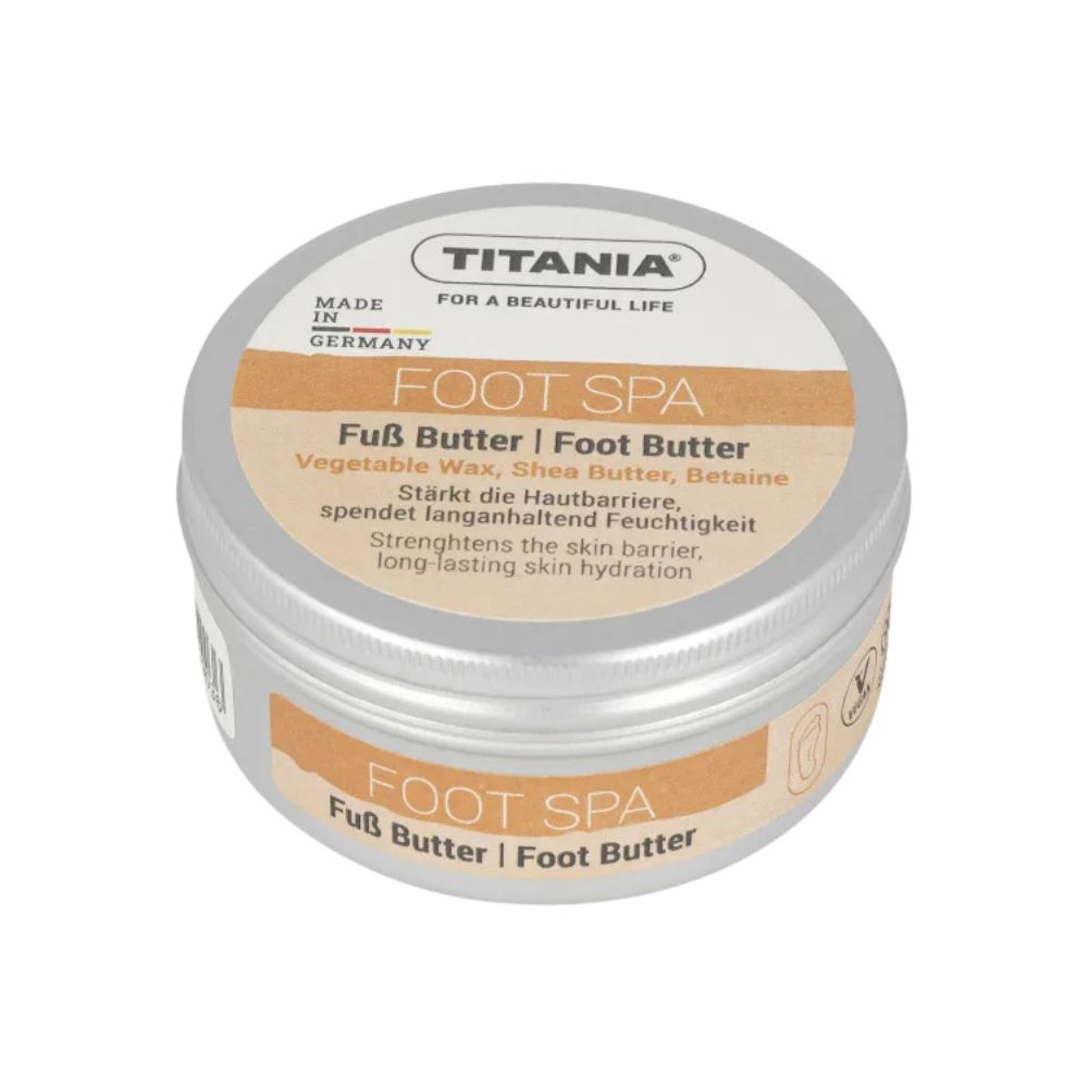 Runde Dose mit Deckel. Aufschrift: TITANIA, FOOT SPA, Fuß Butter. Text in Deutsch und Englisch. Made in Germany.