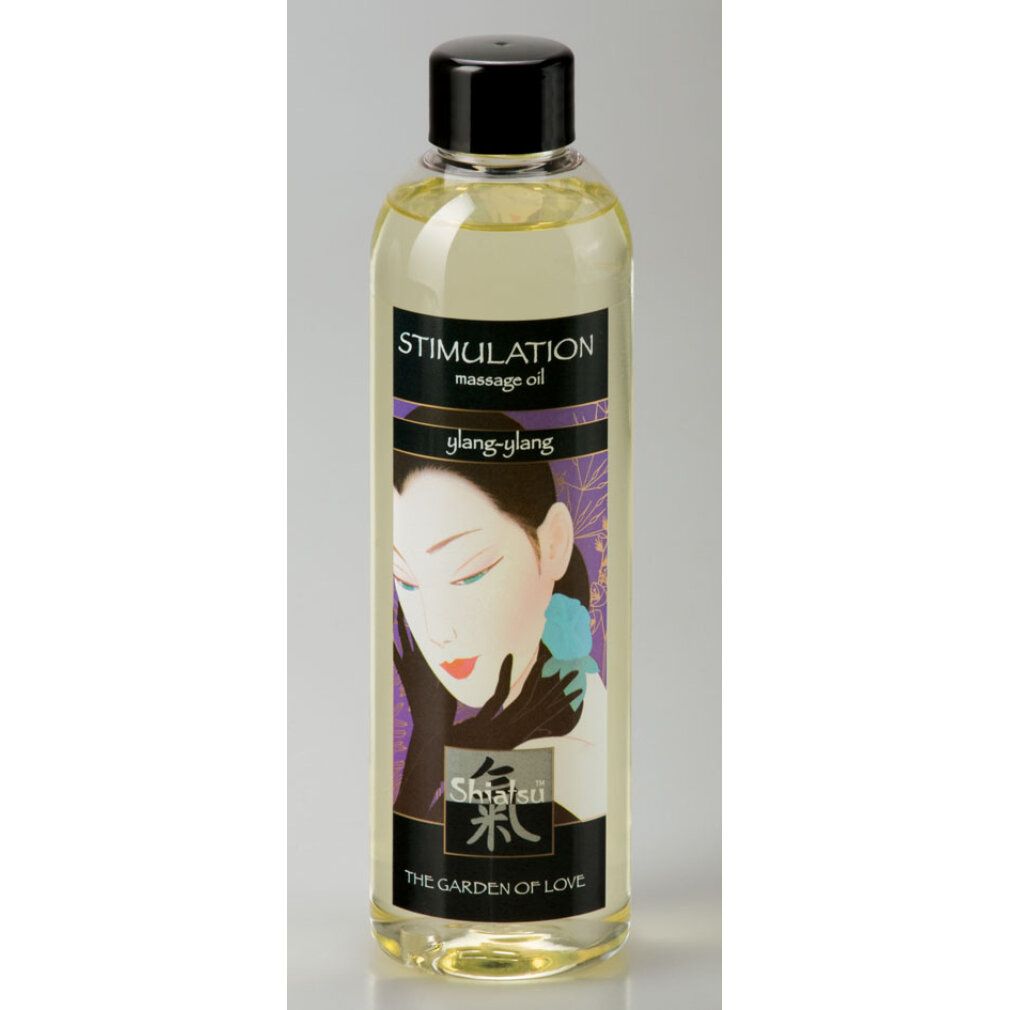 Klare Flasche mit schwarzem Deckel. Aufschrift: Stimulation massage oil, ylang-ylang, Shiatsu, The Garden of Love, 250ml. Abbildung einer Frau.