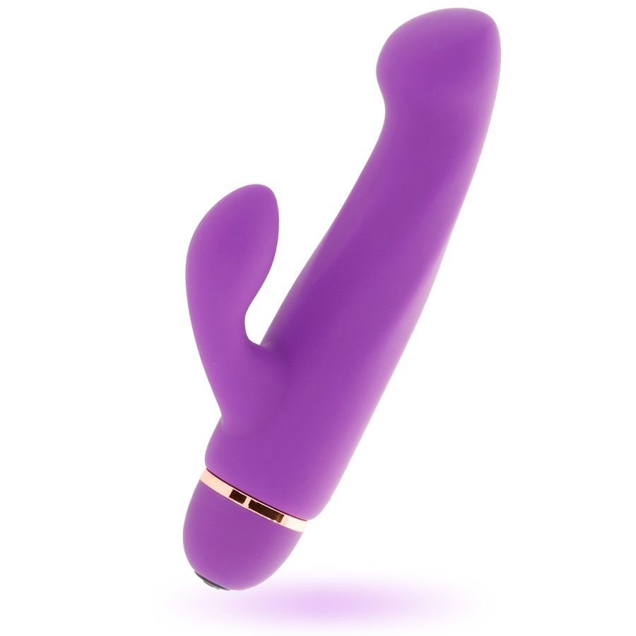 Lila Vibrator mit geschwungener Form. Goldfarbener Ring am unteren Ende. Zwei abgerundete Enden.