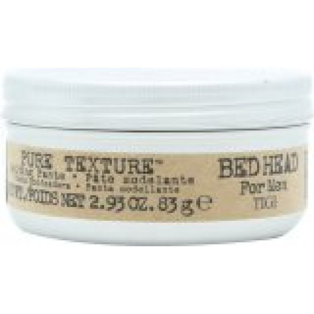 Weiße Dose mit weißem Deckel. Braunes Etikett mit "PURE TEXTURE" und "Bed Head For Men TIGI". Text in Englisch, Spanisch und Französisch.
