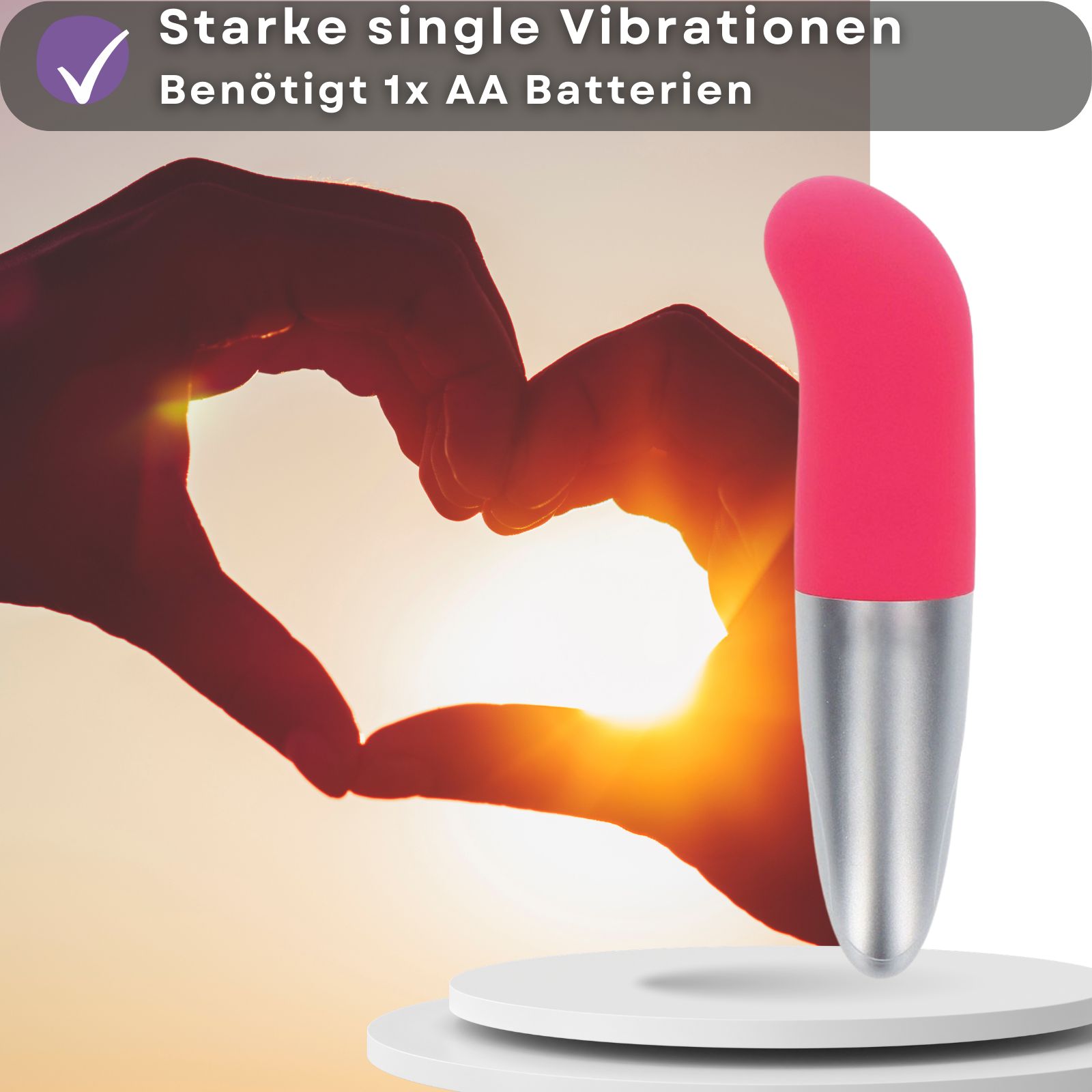 Pinkfarbener Vibrator mit silberfarbenem Schaft. Text: Starke Vibrationen, AA-Batterie.