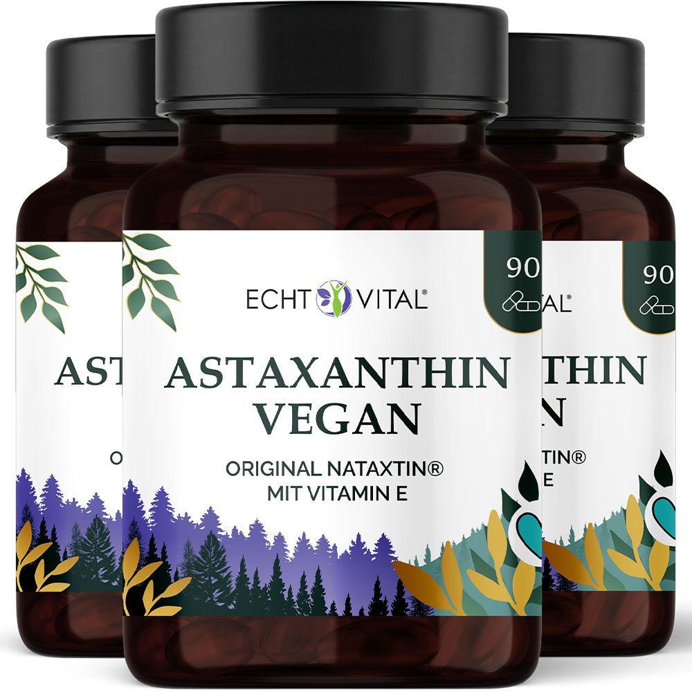 Drei Flaschen Echt Vital Astaxanthin Vegan mit Vitamin E. Dunkle Glasbehälter mit schwarzen Deckeln.
