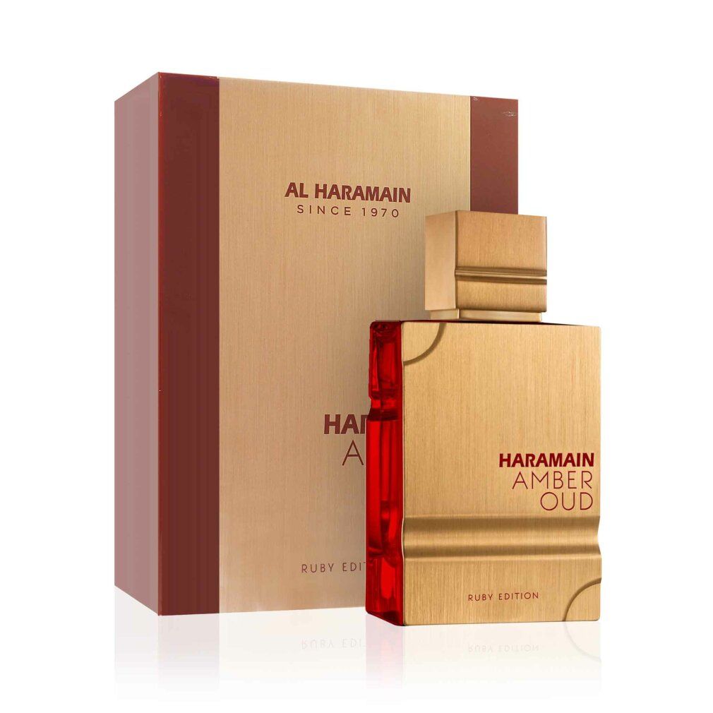 Goldfarbener Flakon und Verpackung. Aufschrift: Al Haramain, Amber Oud Ruby Edition. Roter Akzent. Eckige Form.