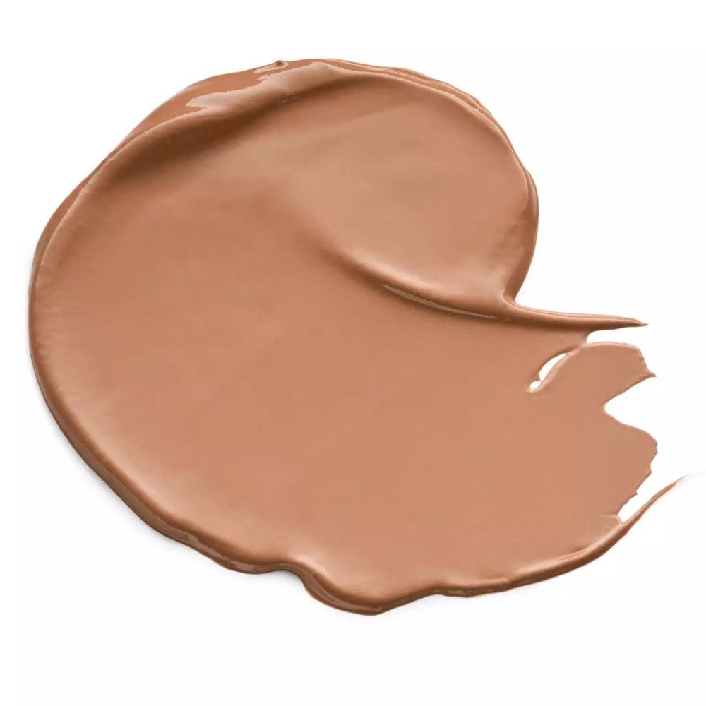 Beige Flüssig-Concealer-Probe. Farbton. Auf weißem Hintergrund. Glänzende Textur.