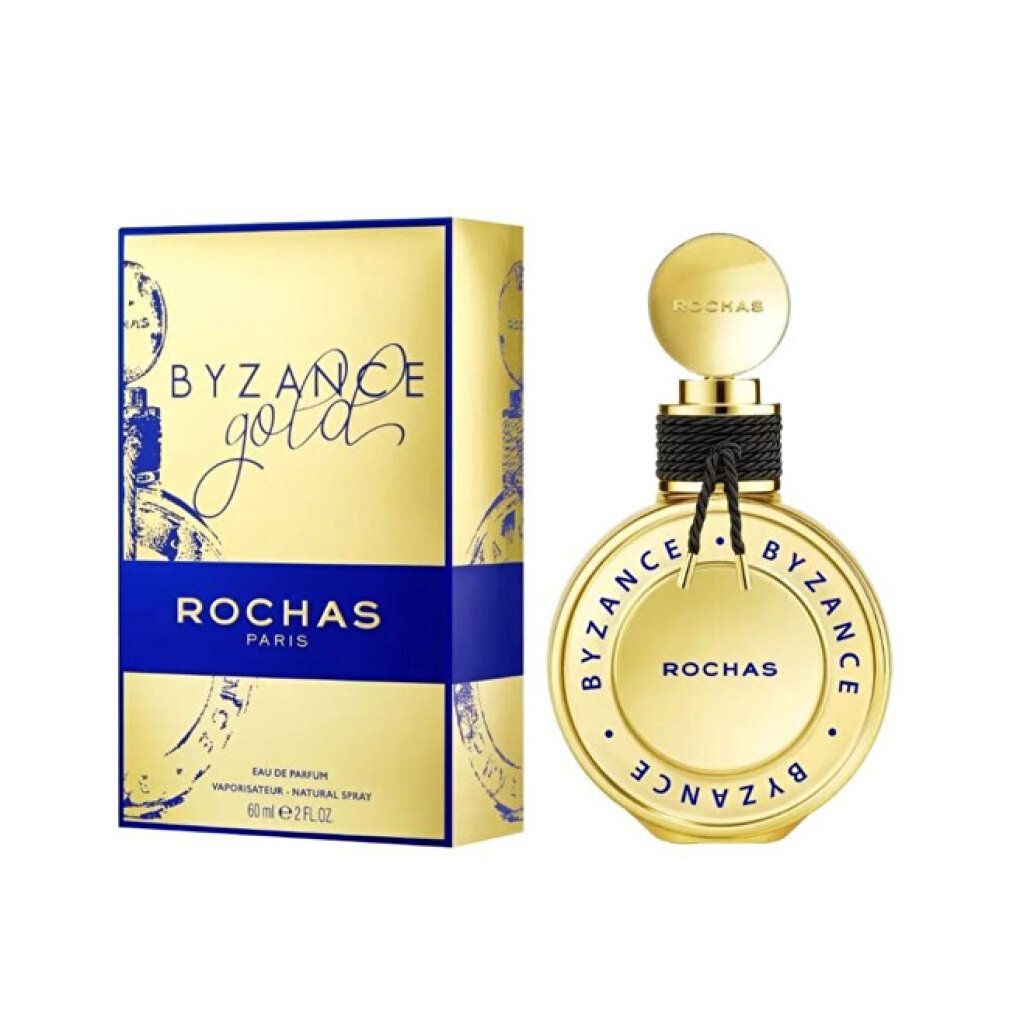 Goldene Schachtel und Flakon. Aufschrift: BYZANCE Gold, ROCHAS PARIS. Flakon mit schwarzem Band.