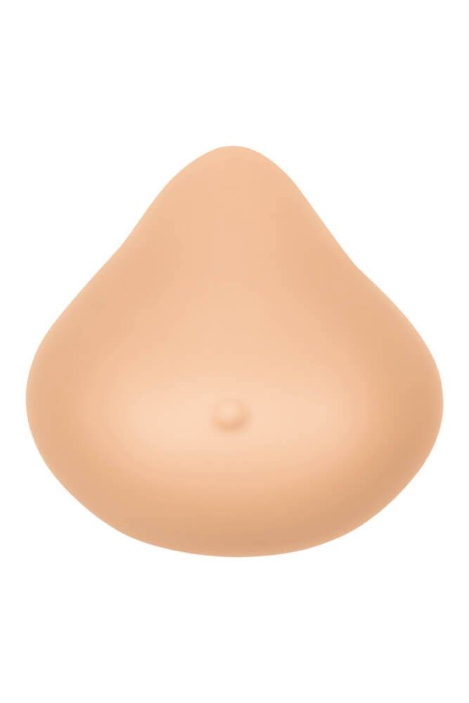 Brustprothese, flache Form, hautfarben. Mit angedeuteter Brustwarze. Tropfenförmig.