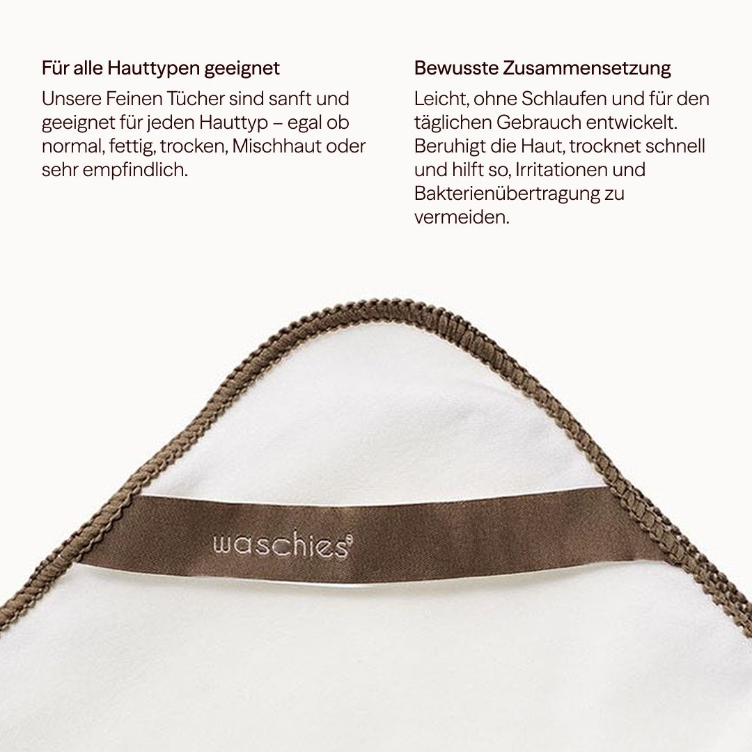 Weißes Gesichtstuch mit brauner Umrandung und Logo. Text: waschies.