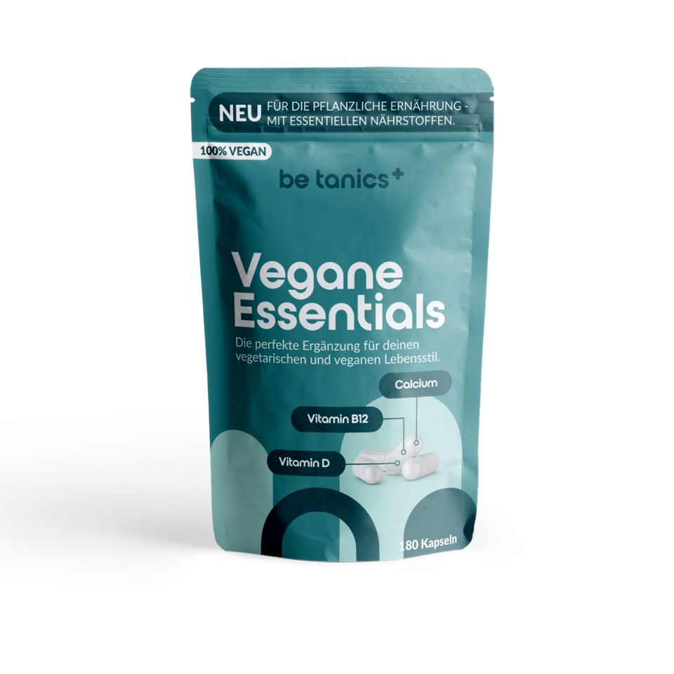 Beutel mit "Vegane Essentials" Kapseln. Aufschrift: "100% Vegan". Enthält Vitamin B12, Vitamin D und Calcium. 80 Kapseln.