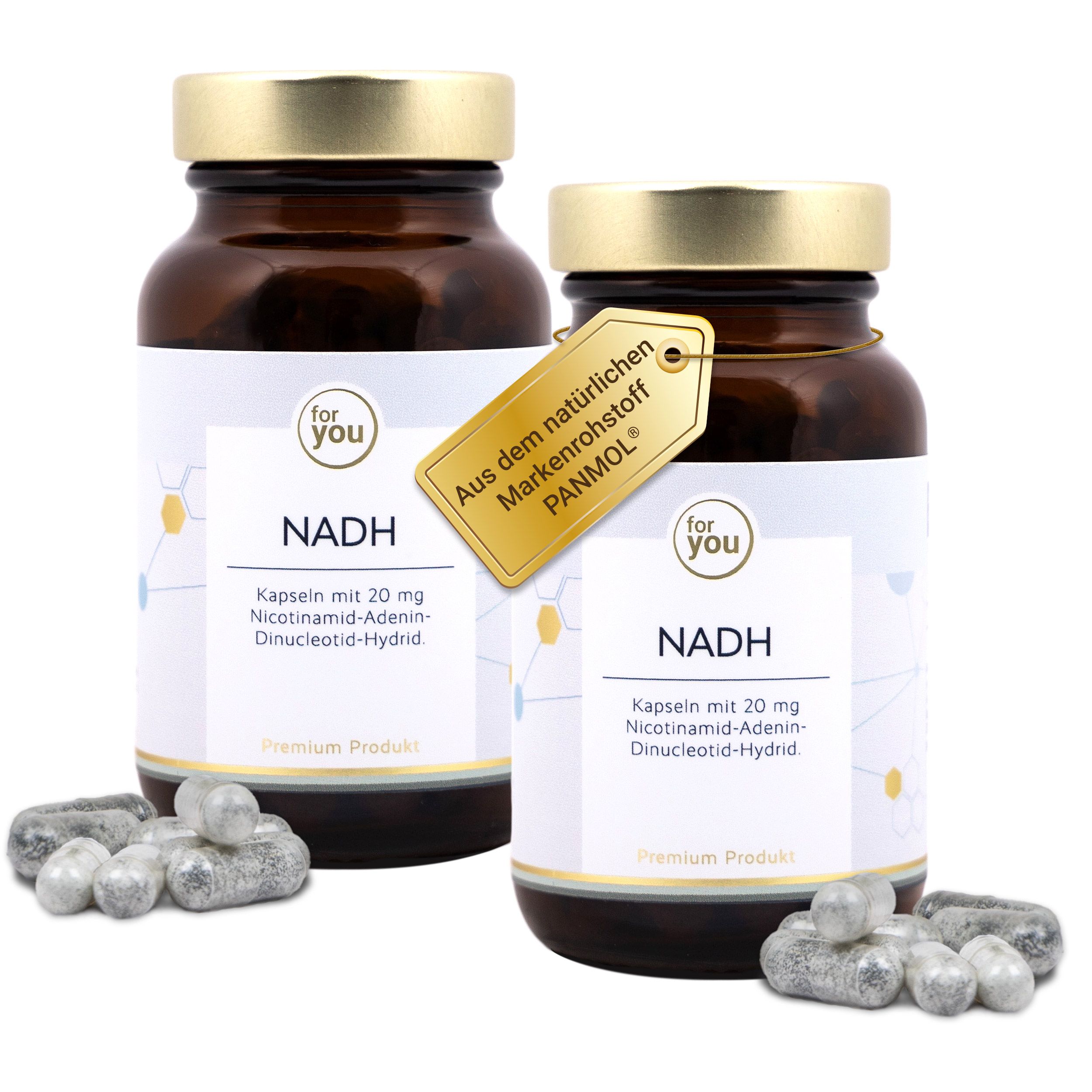Zwei Flaschen NADH-Kapseln stehen nebeneinander. Eine Flasche hat ein Anhängeretikett mit der Aufschrift 'Aus dem natürlichen Markenrohstoff PANMOL®'.