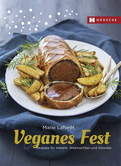 Kochbuch "Veganes Fest" von Marie Laforêt. Auf dem Cover: Gericht mit Braten, Kartoffeln und Soße. Verlag HÄDECKE.