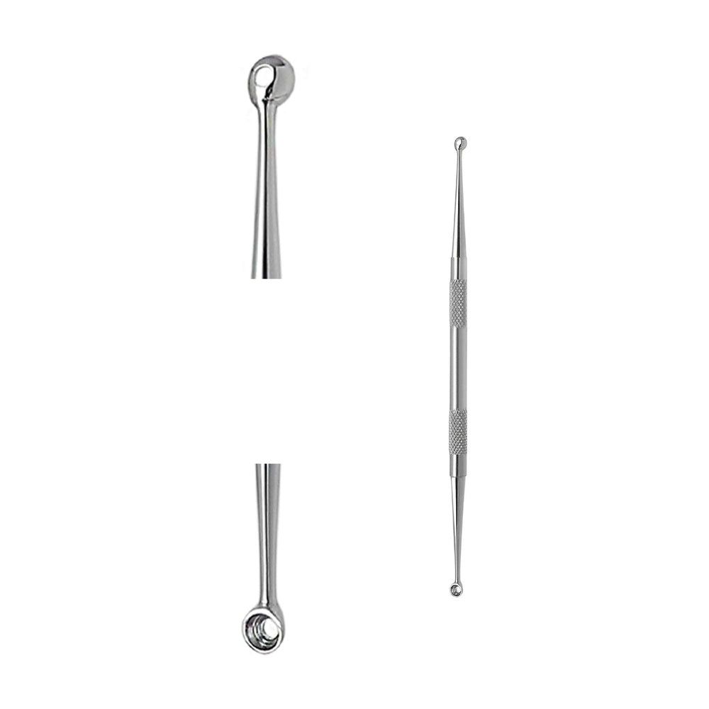 Doppelseitiger Komedonenheber aus Metall. Ein Ende mit Öse, das andere spitz. Mittig geriffelt.