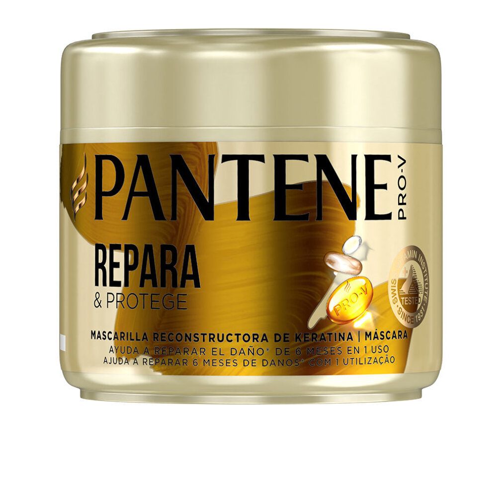Goldfarbene Dose mit Pantene Pro-V-Logo und Schriftzug REPARA & PROTEGE. Aufschrift: Mascarilla Reconstructora de Keratina.