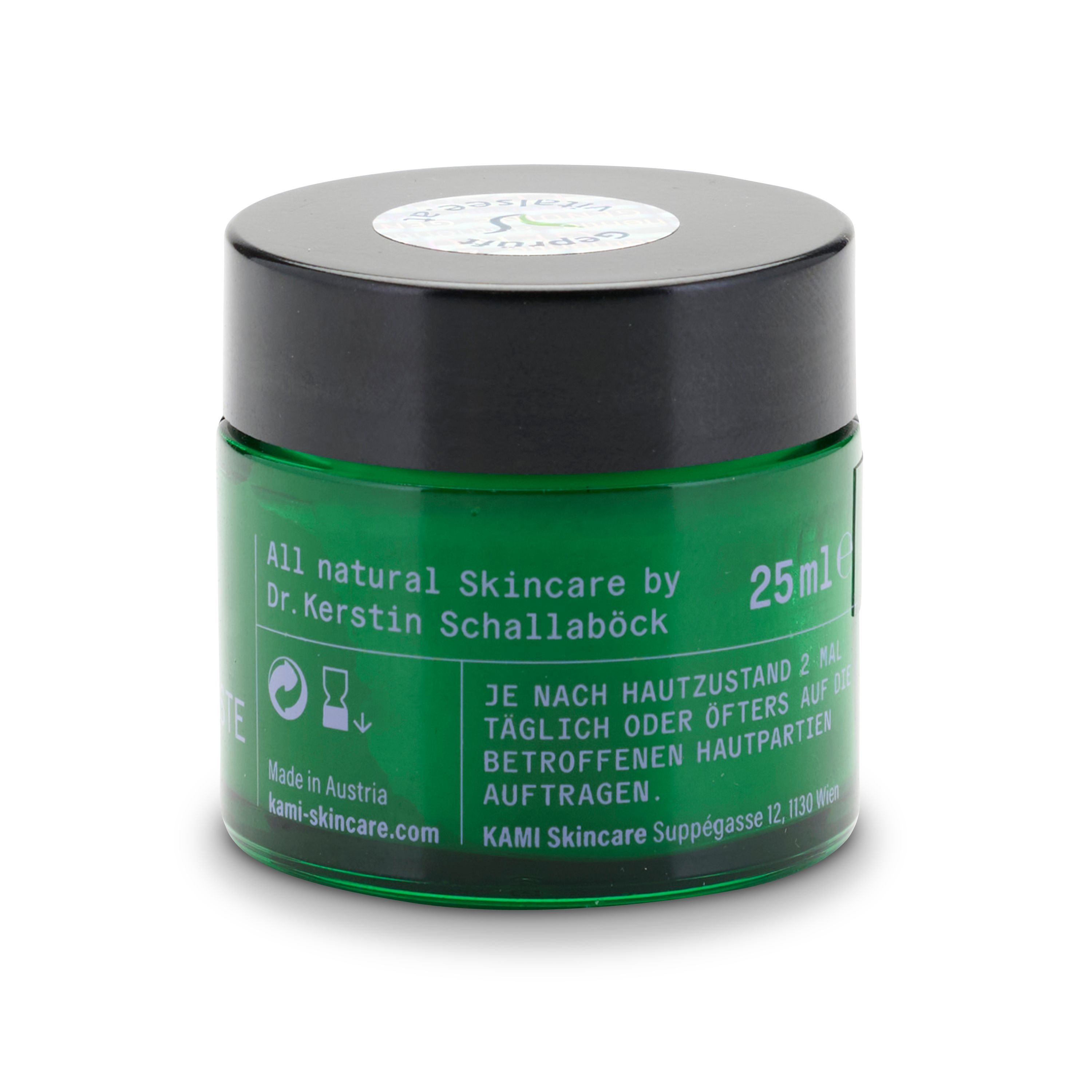 Grünes Glas mit schwarzem Deckel. Aufschrift: vitalsee, KAMI. Auf dem Deckel: Aufkleber. Text auf dem Glas.