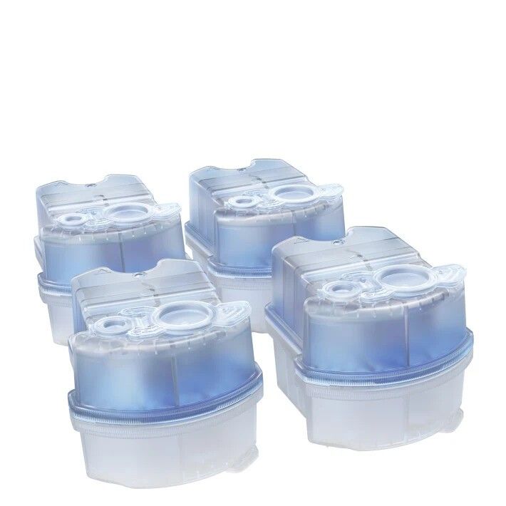 Vier blaue Nachfüllkartuschen. Transparente Deckel. Einzeln angeordnet.