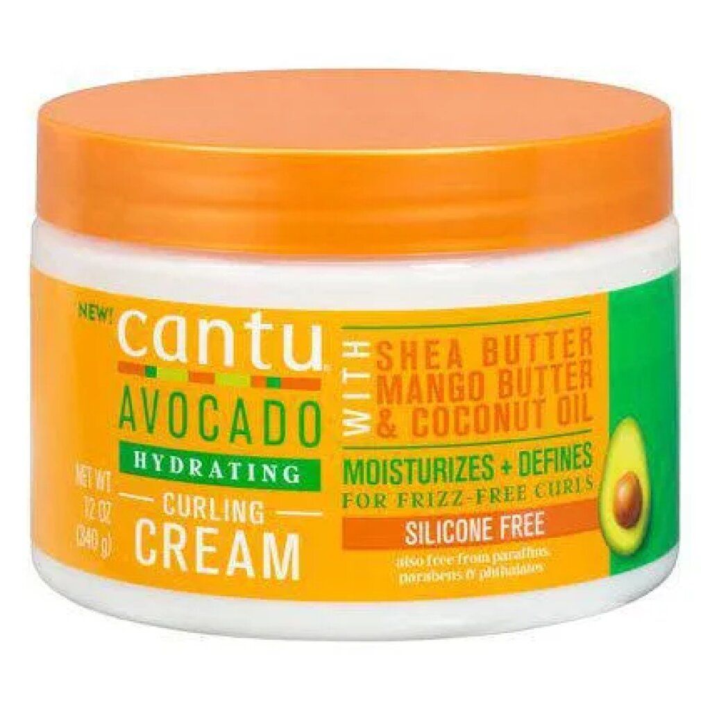 Cantu Avocado Hydrating Curling Cream. Behälter mit orangefarbenem Deckel und grün-gelbem Etikett. Enthält Shea Butter, Mango Butter & Kokosöl.