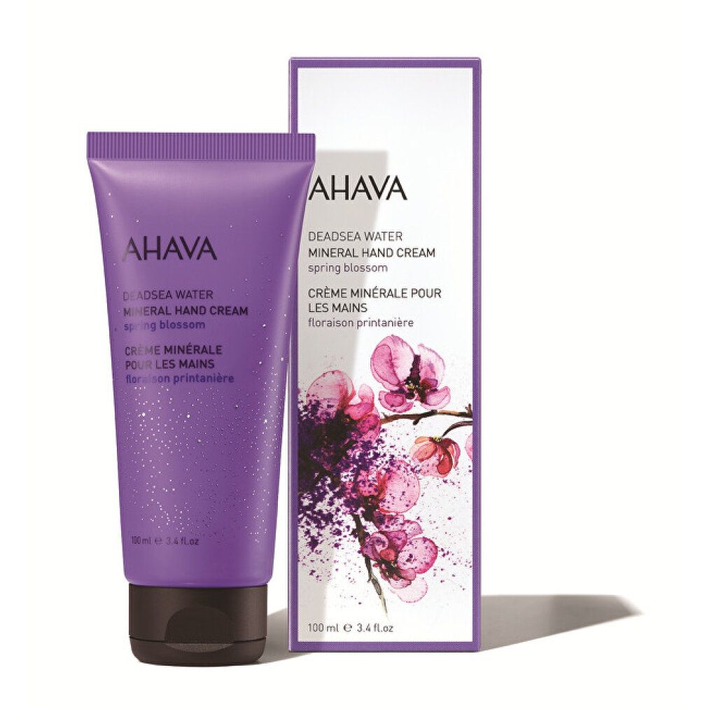 AHAVA Mineral Hand Cream Tube und Box mit Blumen.