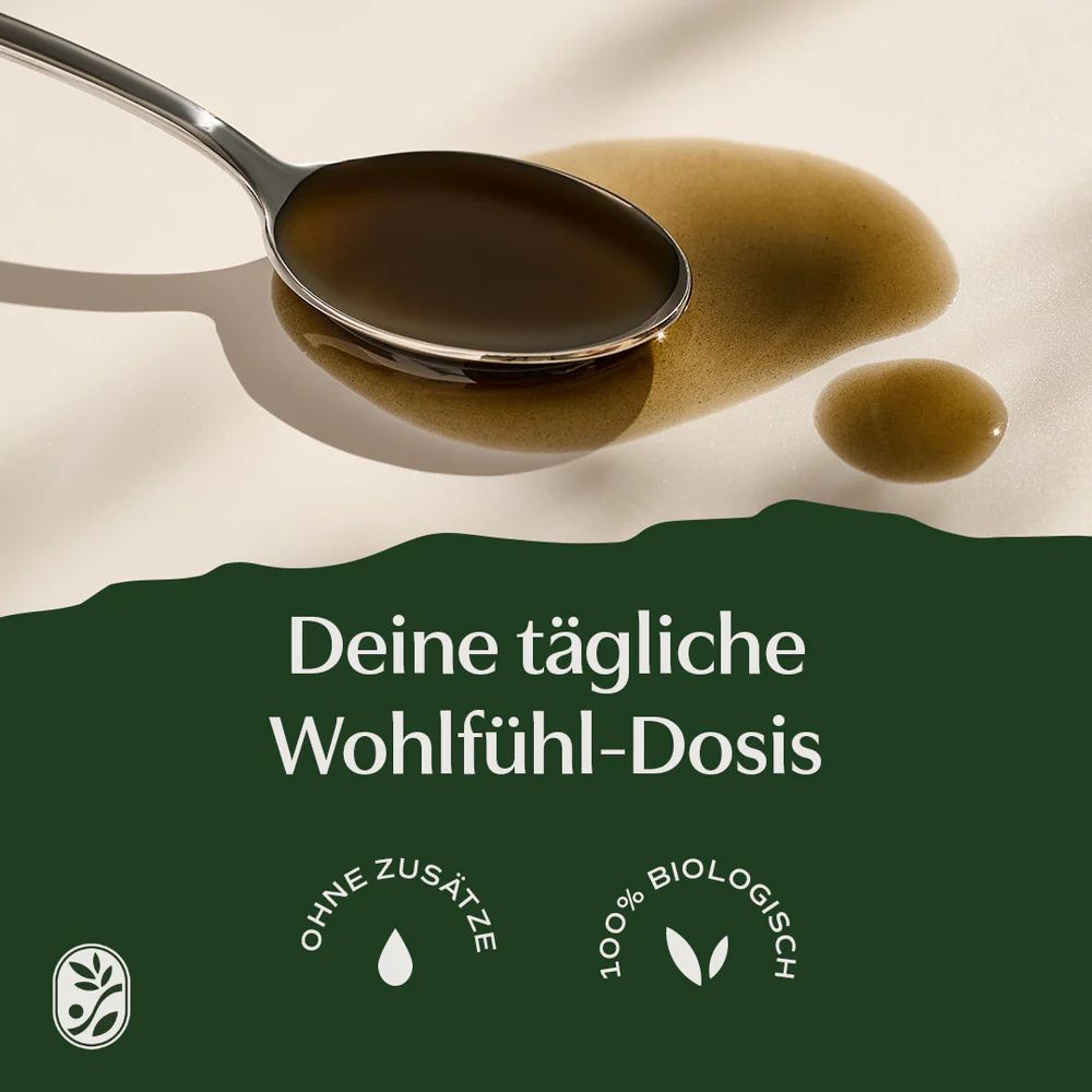 Löffel mit Öl. Tropfen daneben. Text: Deine tägliche Wohlfühl-Dosis. Ohne Zusätze, 100% biologisch.