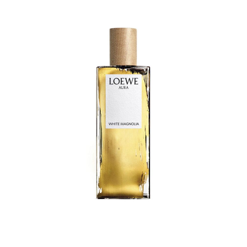 Rechteckiger Flakon mit Holzverschluss. Auf weißem Etikett: LOEWE AURA, WHITE MAGNOLIA. Goldfarbene Flüssigkeit sichtbar.