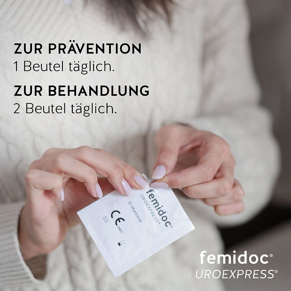 femidoc® UROEXPRESS® Packung. Rosa-weiße Schachtel mit Produktinformationen und Logo. 14 Beutel.