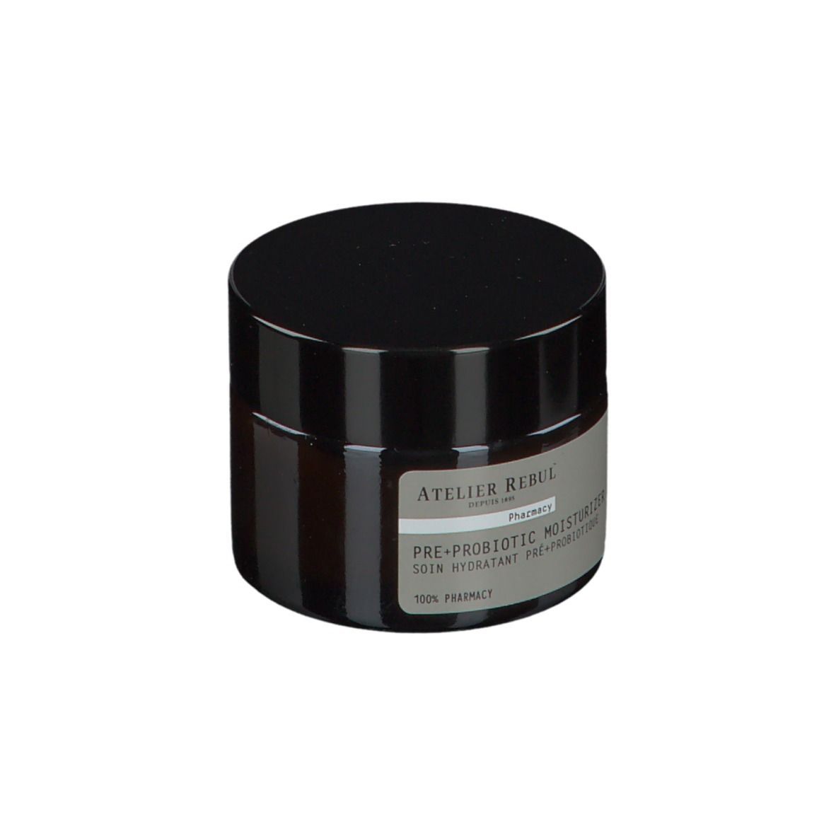 Braune Creme-Dose mit schwarzem Deckel. Auf dem Etikett steht: ATELIER REBUL PRE+ PROBIOTIC MOISTURIZER.