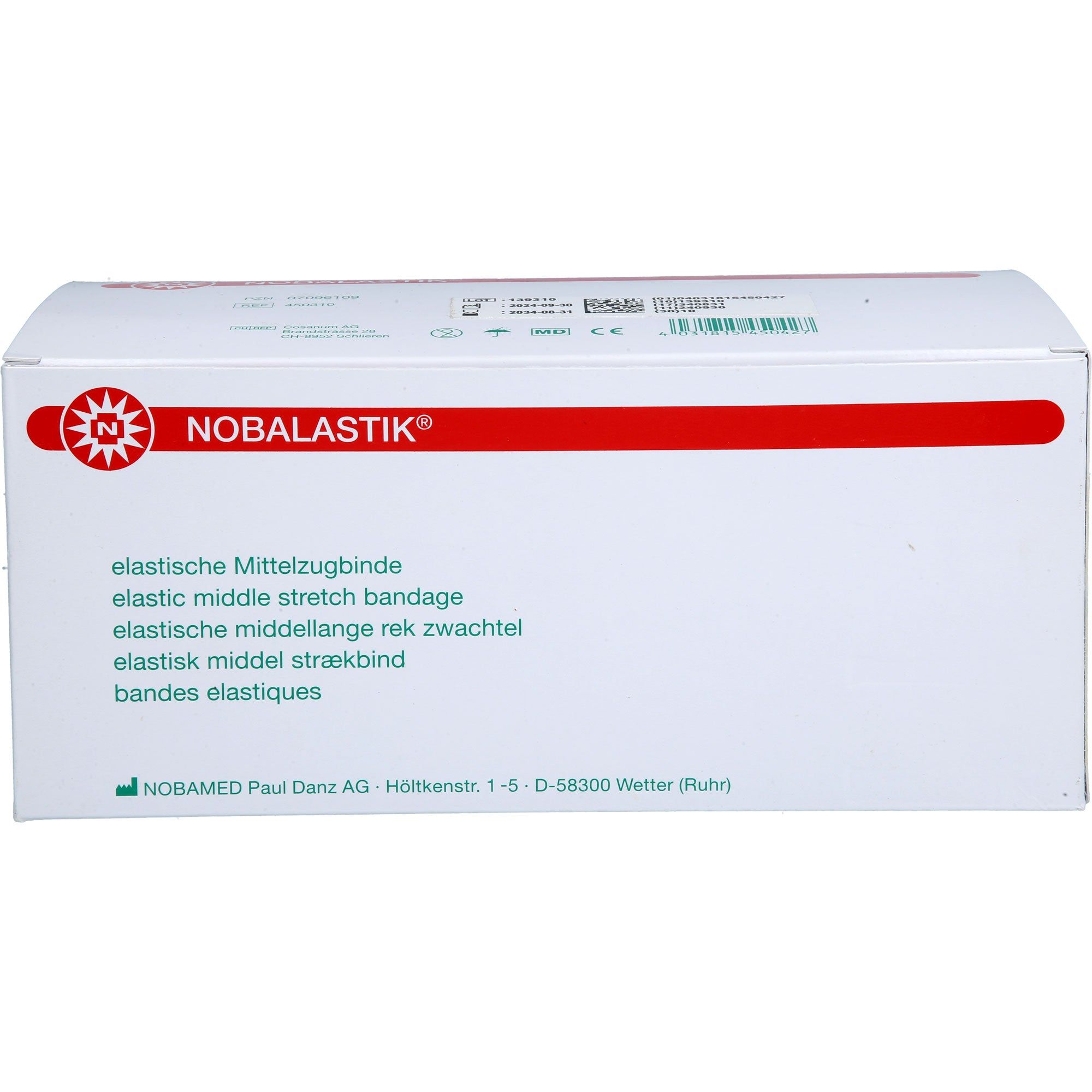 Weiße Verpackung mit rotem Streifen und Logo. Text: NOBALASTIK, elastische Mittelzugbinde. Herstelleradresse.