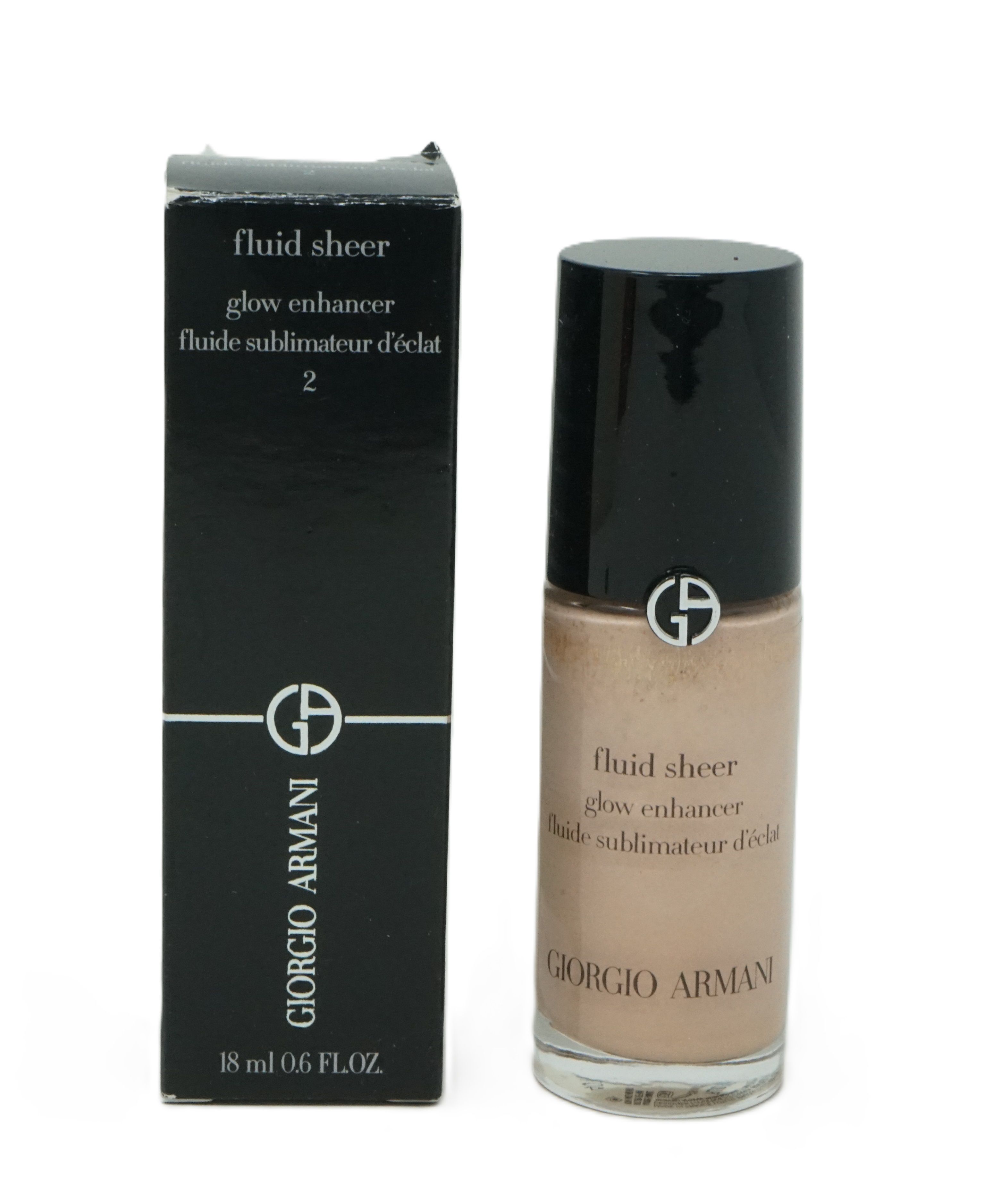 Highlighter-Flüssigkeit und Schachtel. Schwarze Schachtel mit Produktname und Logo. Flasche daneben.