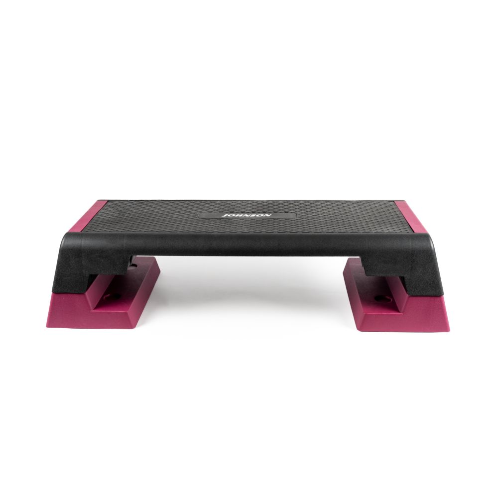 Aerobic Stepper. Schwarz und pink. Geriffelte Oberfläche. Marke JOHNSON.