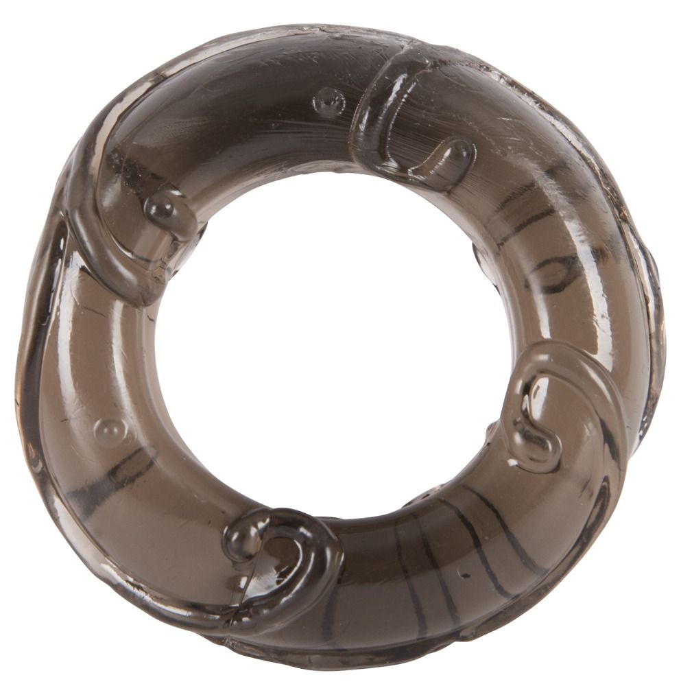 Schwarzer, flexibler Penisring mit einer glatten Oberfläche und dekorativen Elementen. Das Produkt hat eine runde Form mit einem Loch in der Mitte.