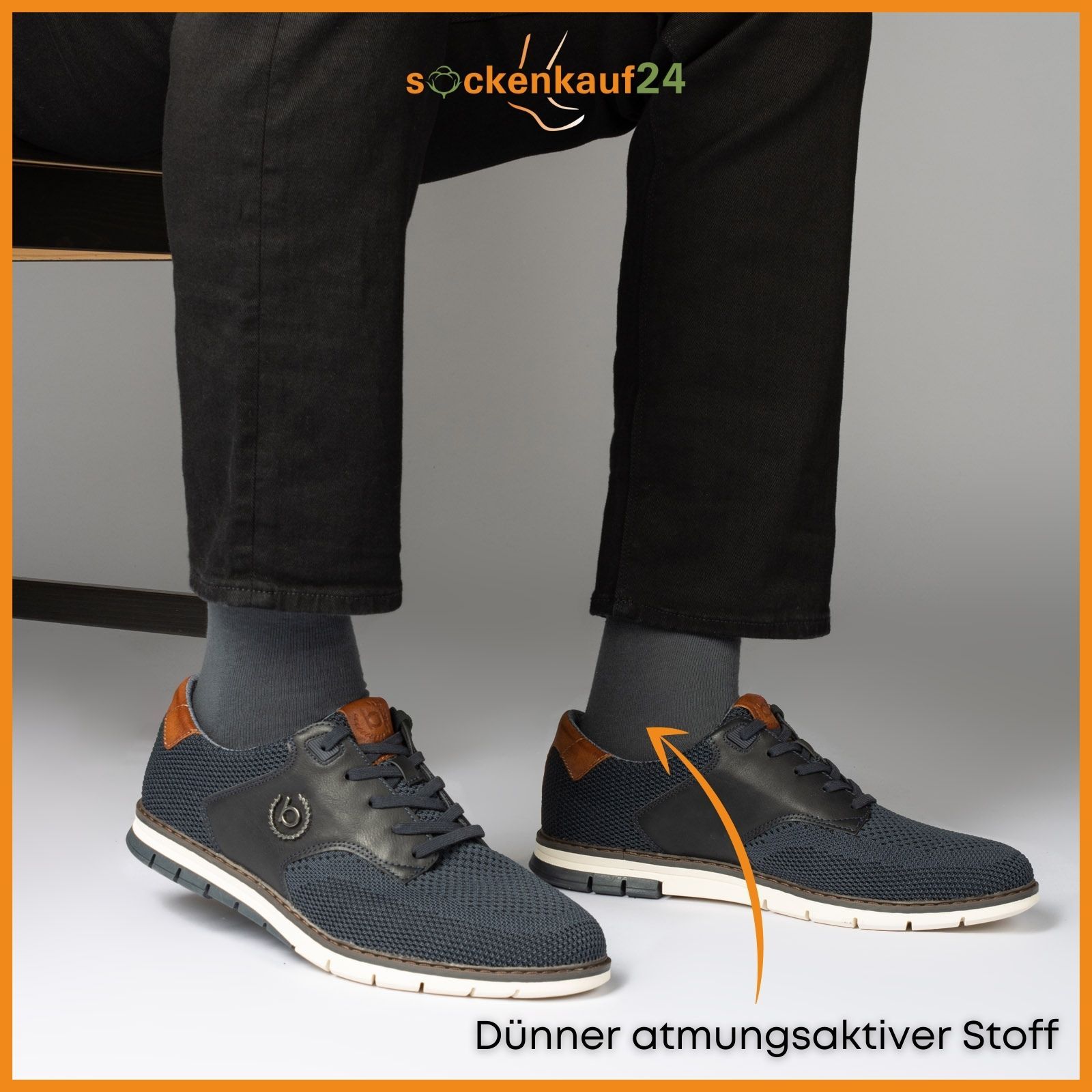 Person trägt graue Diabetiker Socken unter Jeans und Sneaker. Text: Dünner atmungsaktiver Stoff.