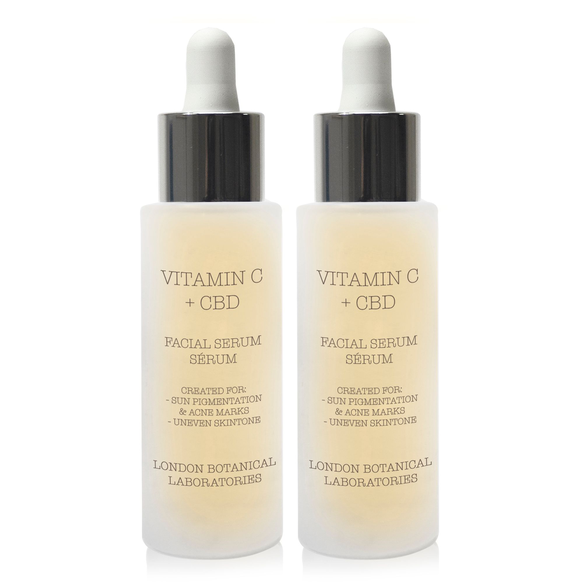 Zwei Serumflaschen mit Pipetten. Aufschrift: Vitamin C + CBD. Marke: London Botanical Laboratories. Text: Facial Serum.