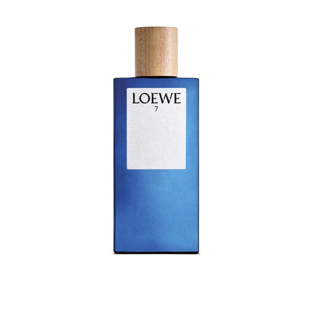 Blaues rechteckiges Parfümflakon mit Holzverschluss. Auf weißem Etikett steht "LOEWE 7".