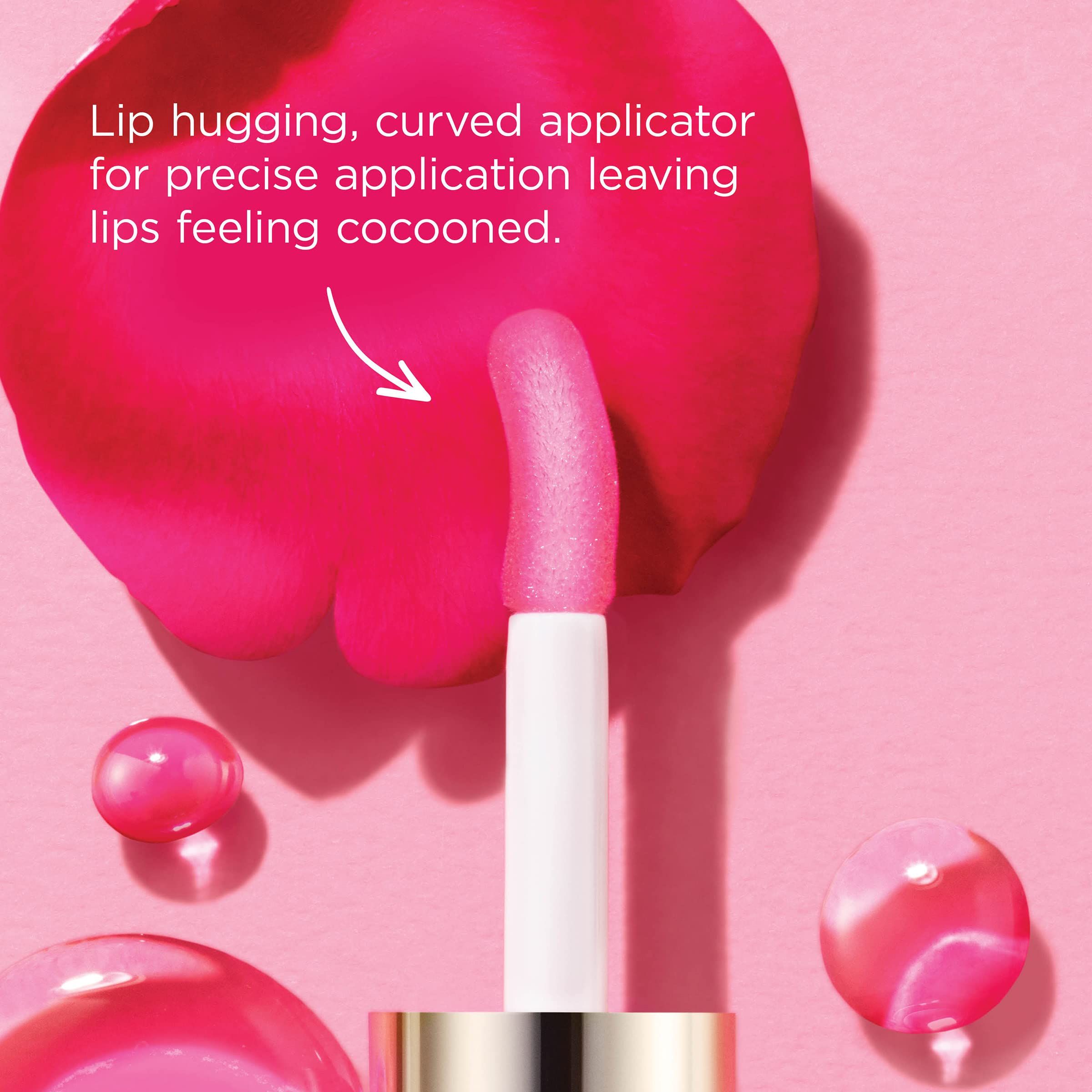 Applikator mit rosa Lippenöl vor einer Rosenblatt-Textur. Beschreibt den Applikator.