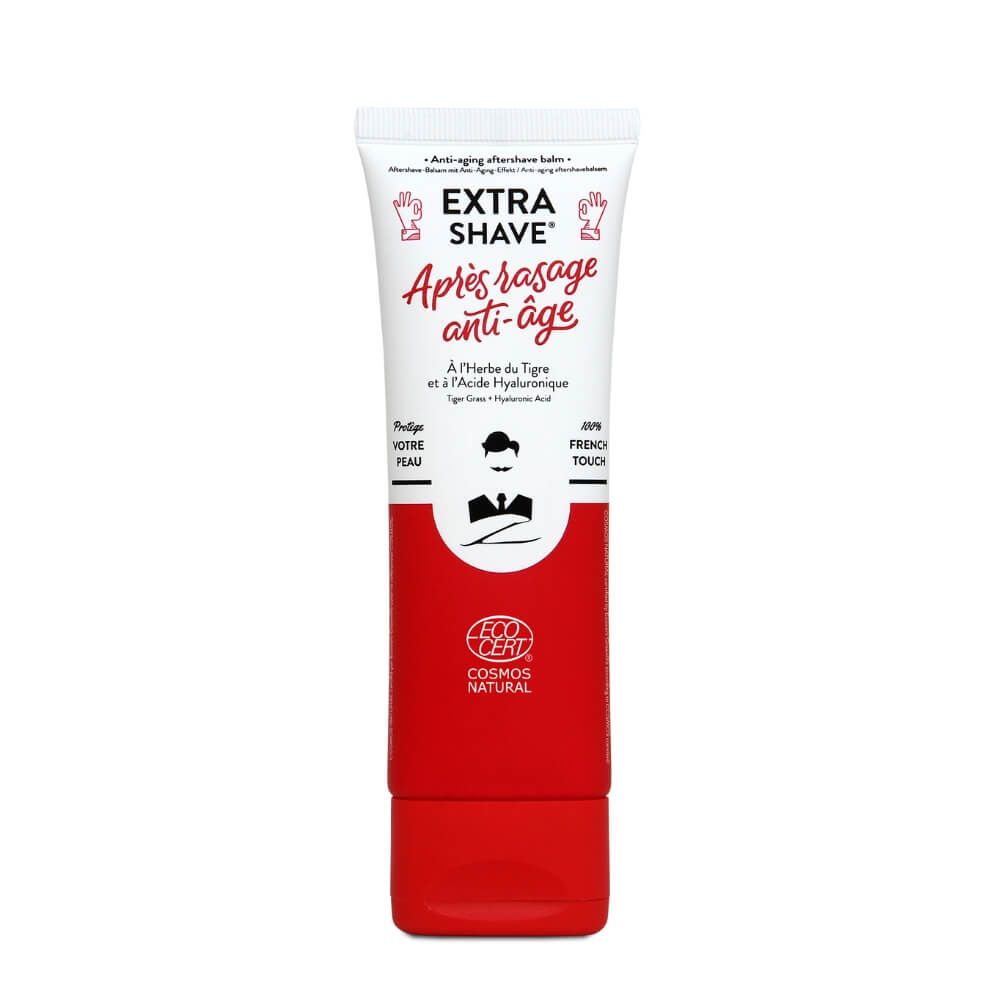 Aufrecht stehende Tube Monsieur BARBIER Aftershave. Weiß-rotes Design mit Schriftzug 'Extra Shave' und 'Après rasage anti-âge'.