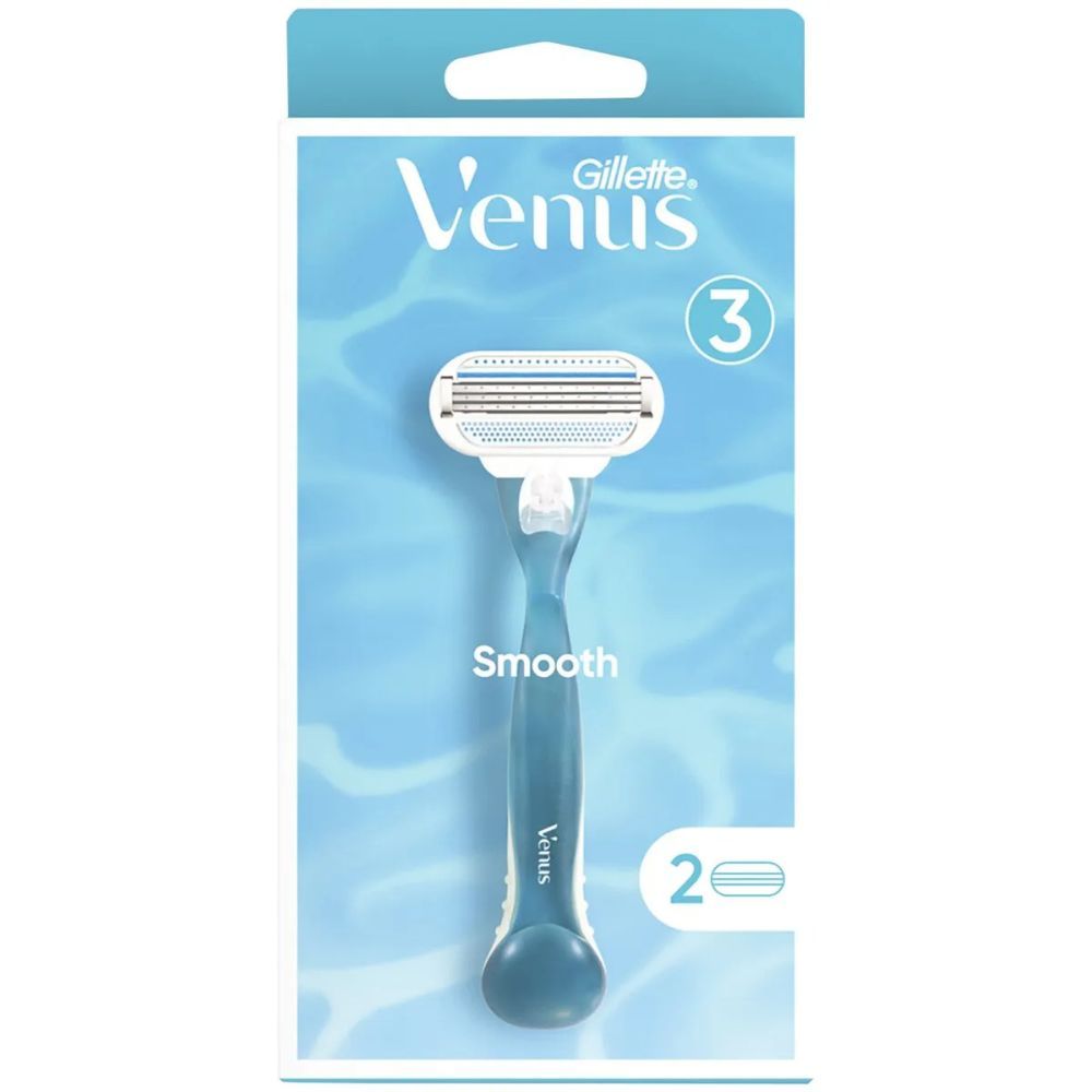 Gillette Venus Rasierer. Blau-weißer Griff, 3 Klingen, 2 Ersatzklingen. Verpackung mit Produktabbildung.