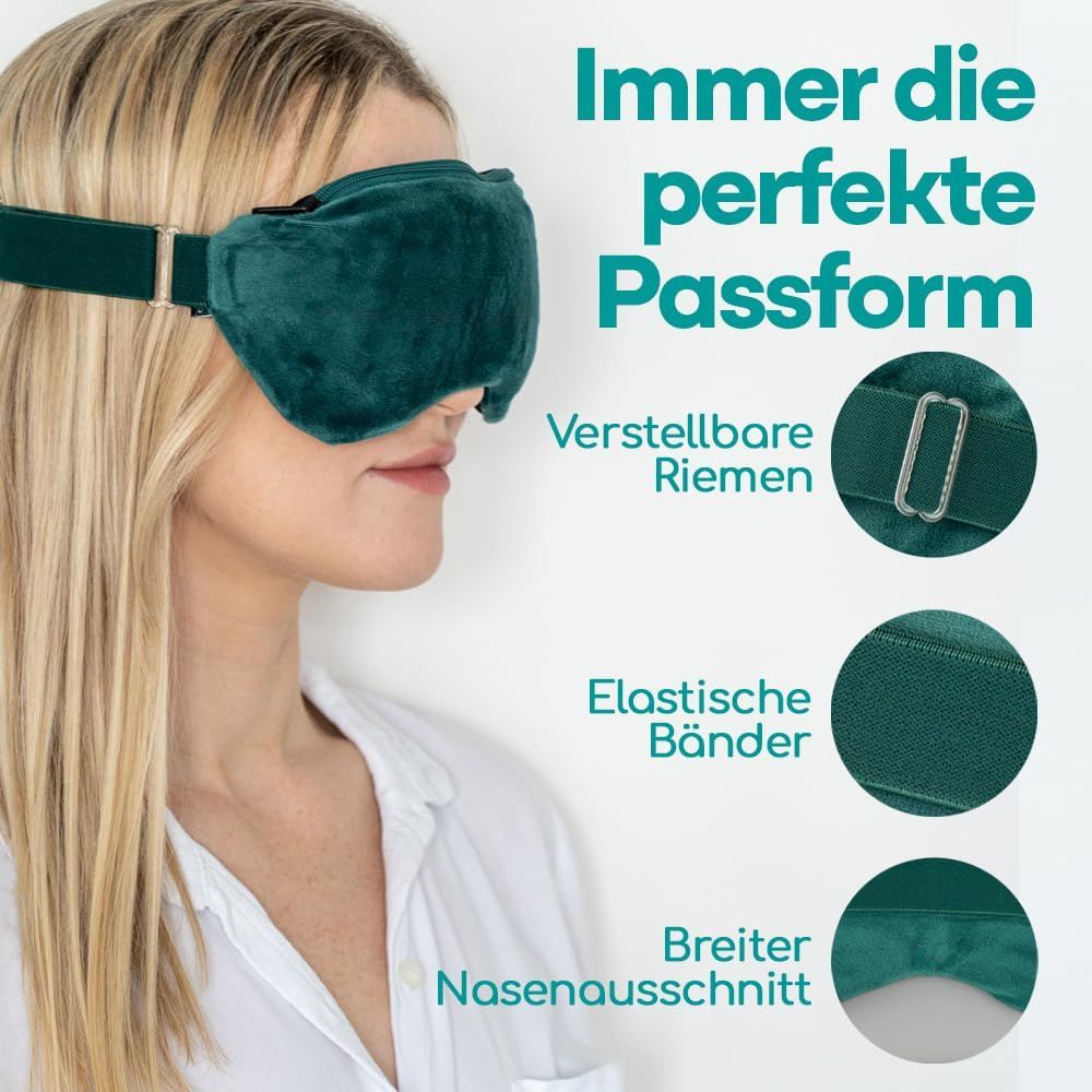 Eine Frau trägt eine smaragdgrüne Schlafmaske mit verstellbaren Riemen und einem Nasenausschnitt.