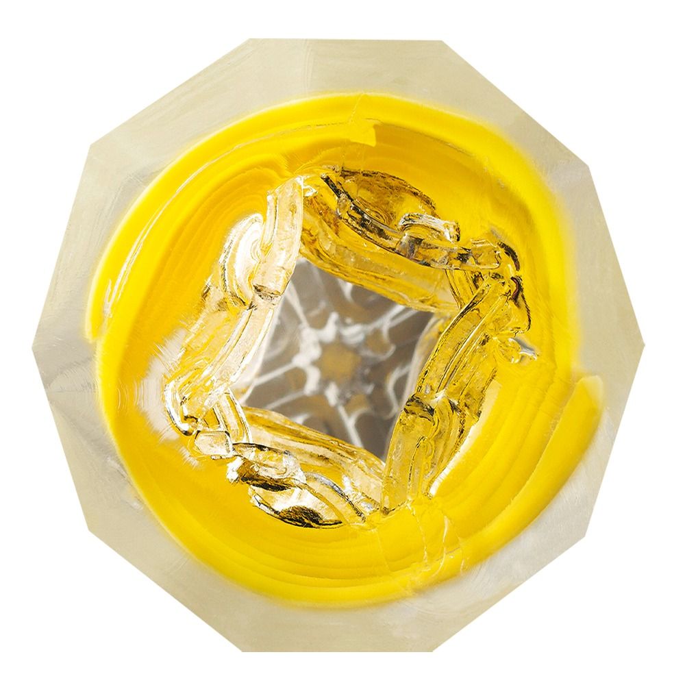 Oberansicht des TENGA Spinner Deluxe Masturbators mit gelben und silbernen Innenelementen.