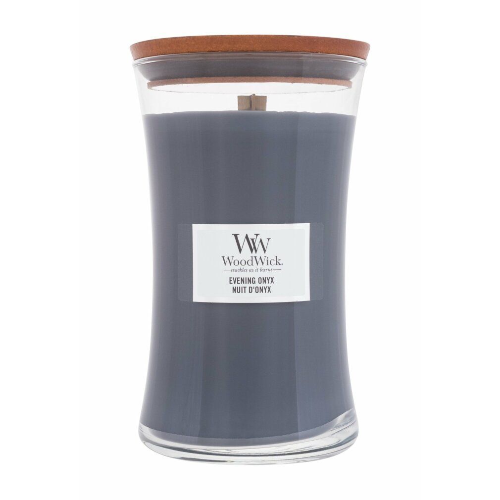 Kerzenglas mit Holzdeckel. Graue Kerze mit Etikett: WoodWick, Evening Onyx. Glasbehälter mit geschwungener Form.