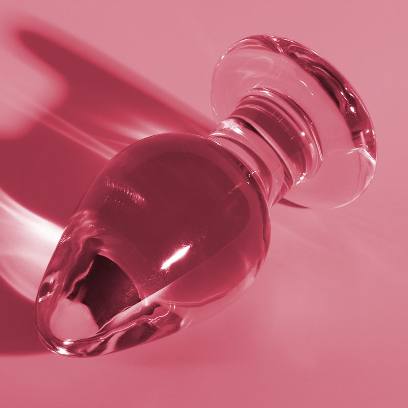 Rosa Glas-Analplug mit breiter Basis, 11 cm lang, 5 cm breit.