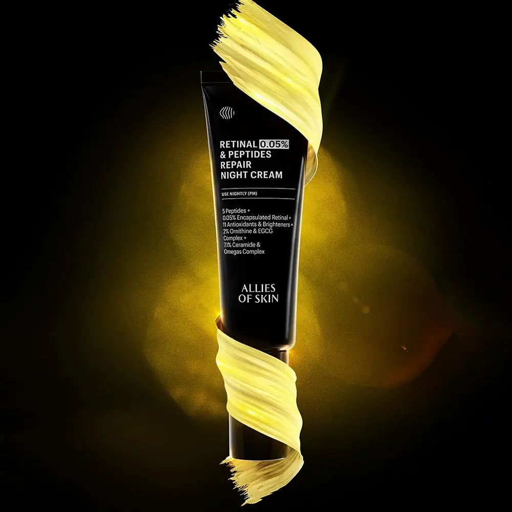 Schwarze Tube mit gelber Creme umwickelt. Text: Retinal 0,05% & Peptides Repair Night Cream. Marke: ALLIES OF SKIN.