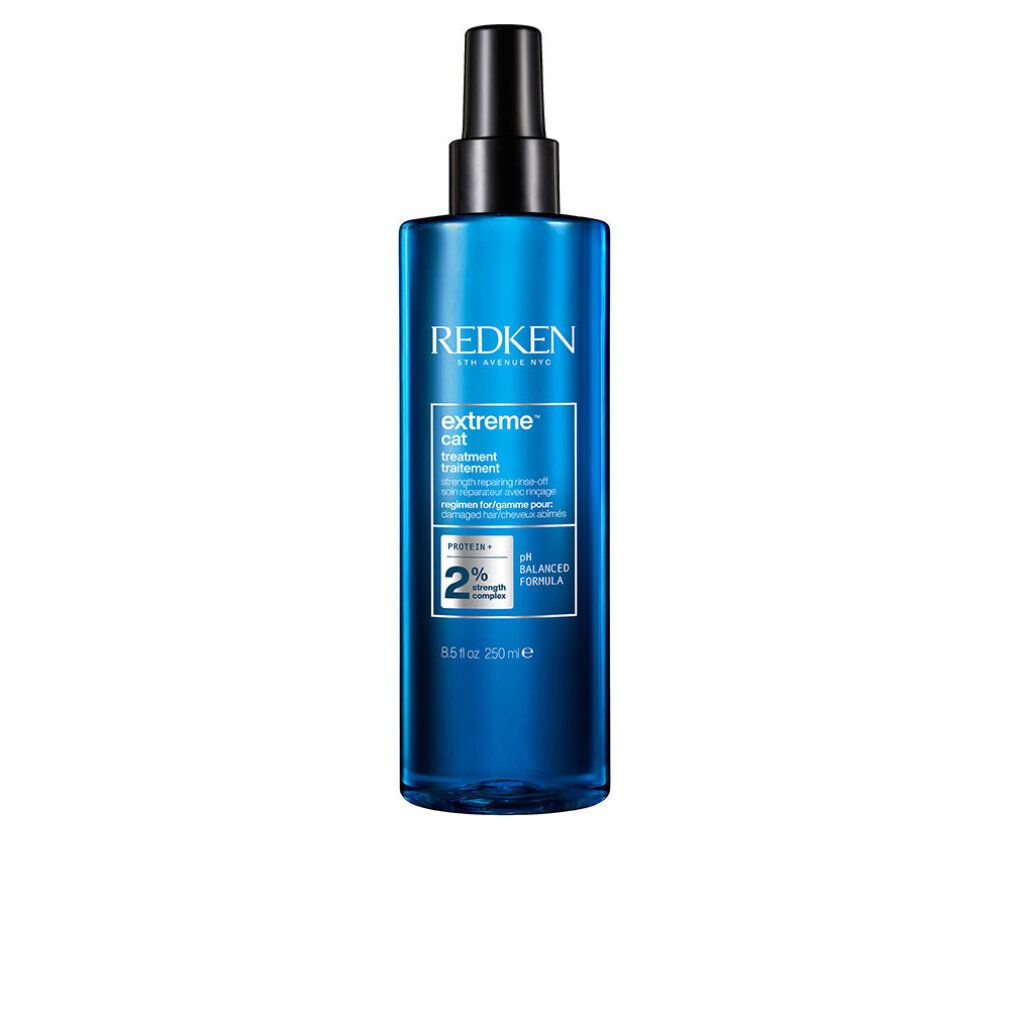 Redken Extreme Cat Treatment. Blaue Flasche mit schwarzem Sprühkopf. Text: Extreme, pH-ausgeglichene Formel, 2% Stärke.