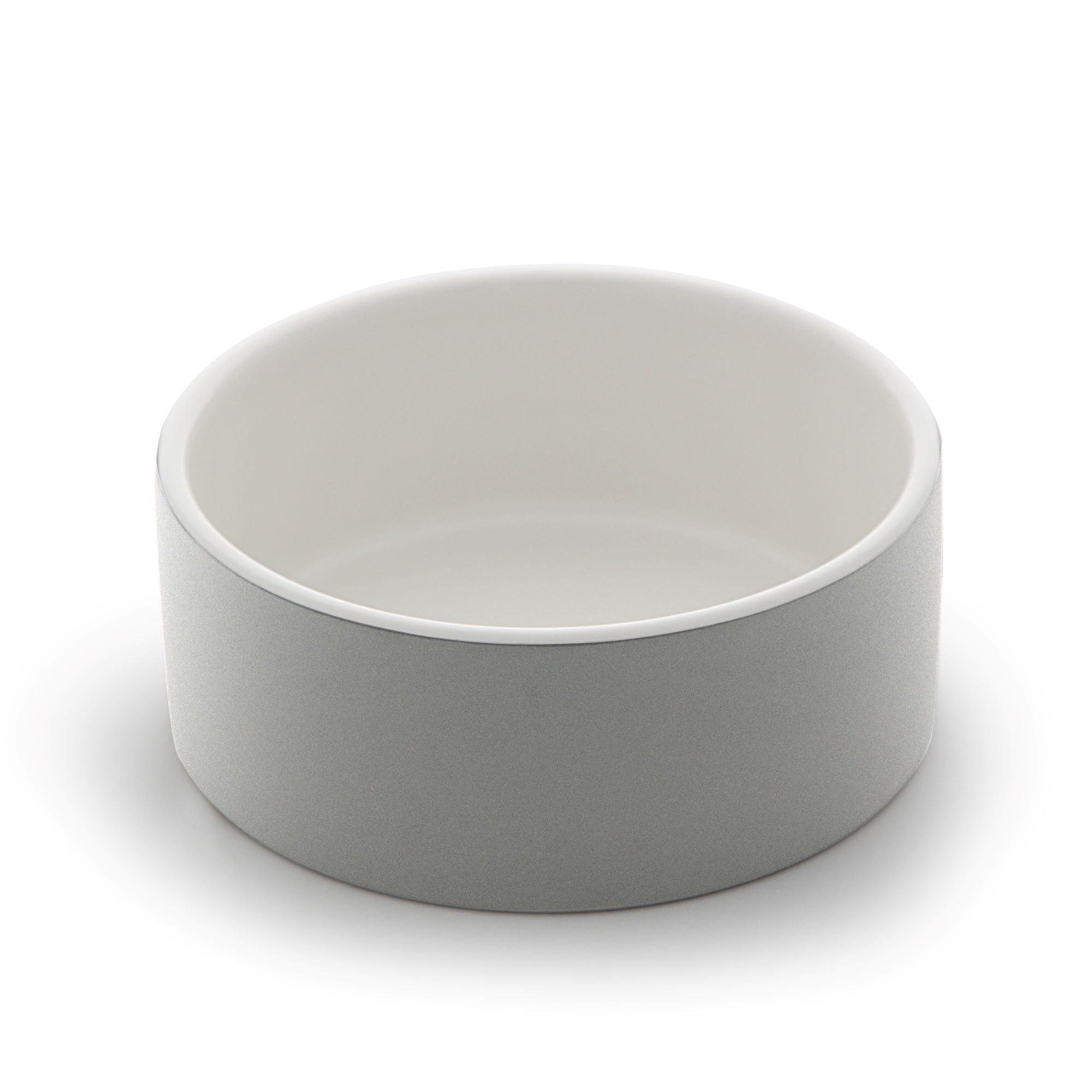 Graue, zylindrische Hundenapf mit weißer Innenseite.