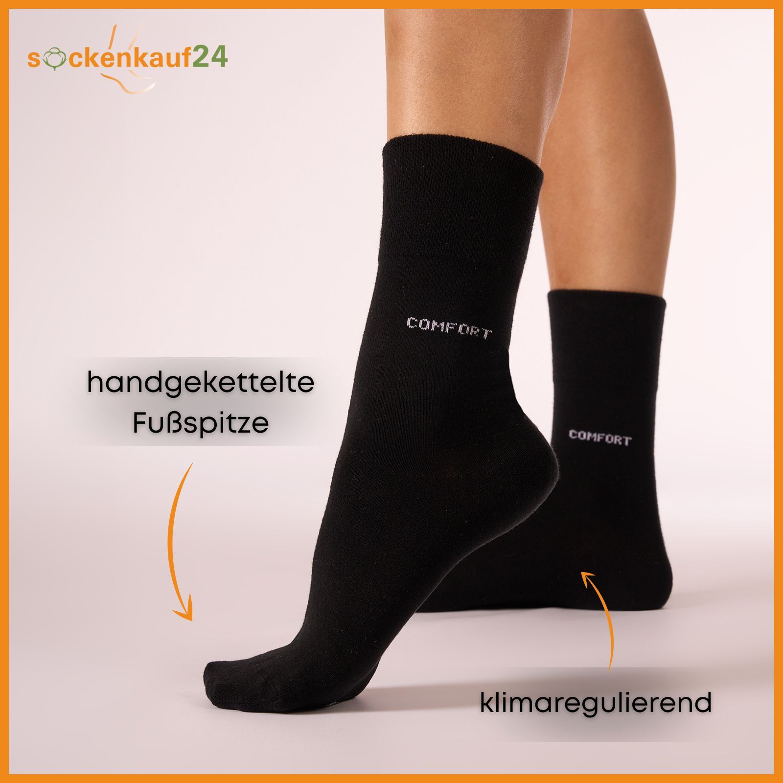 Schwarze Socken am Bein. Aufschrift "COMFORT". Text: "handgekettelte Fußspitze" und "klimaregulierend". Logo "sockenkauf24".