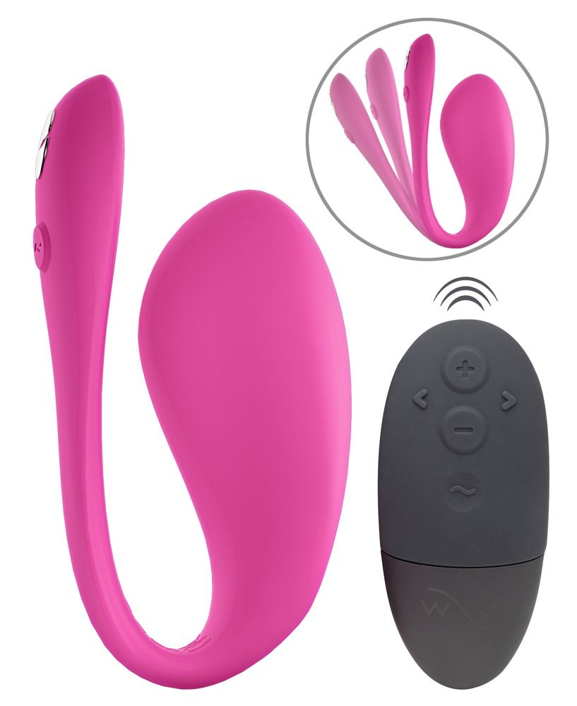 Pinkfarbener Vibrator und Fernbedienung. Vibrator mit geschwungener Form. Fernbedienung grau.