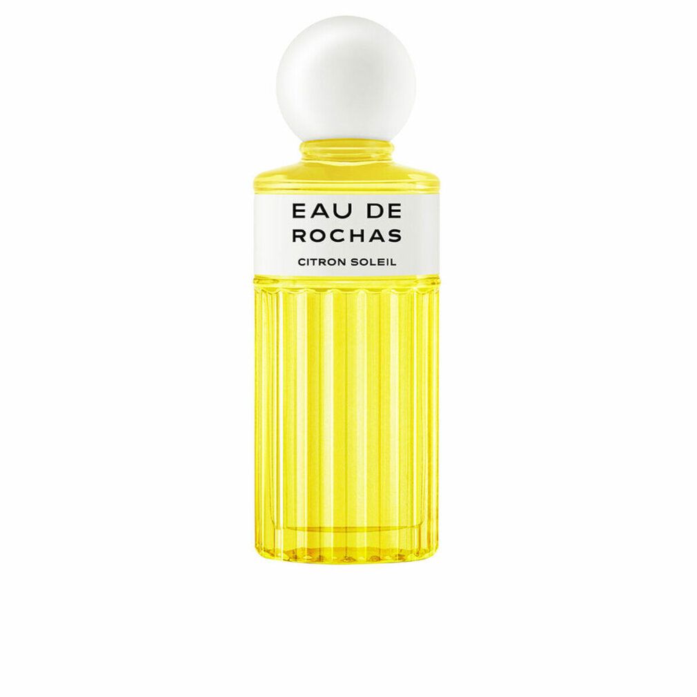 Gelbes Eau de Toilette Spray. Aufschrift: Eau de Rochas Citron Soleil. Flakon mit weißem Deckel. Geriffelte Oberfläche.