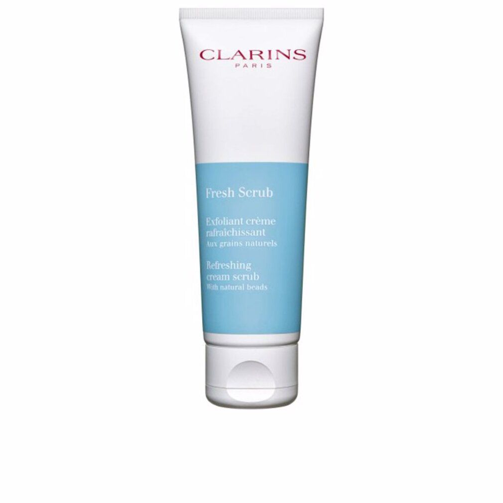 Clarins Fresh Scrub Tube mit blauem Streifen und weißem Verschluss. Enthält feine natürliche Kügelchen.
