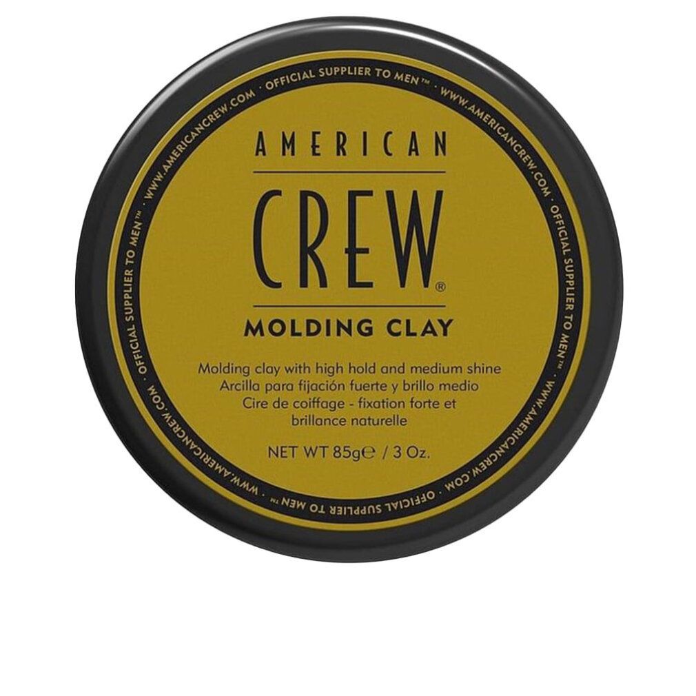 Runde Dose mit schwarzem Deckel und goldenem Etikett. Aufschrift: AMERICAN CREW, Molding Clay. Nettoinhalt: 85g/3 oz.