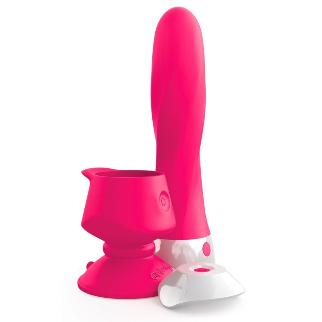 Rosa Vibrator mit weißem Sockel und Zubehör. Enthält Halterung und Basis. Auf weißem Hintergrund.