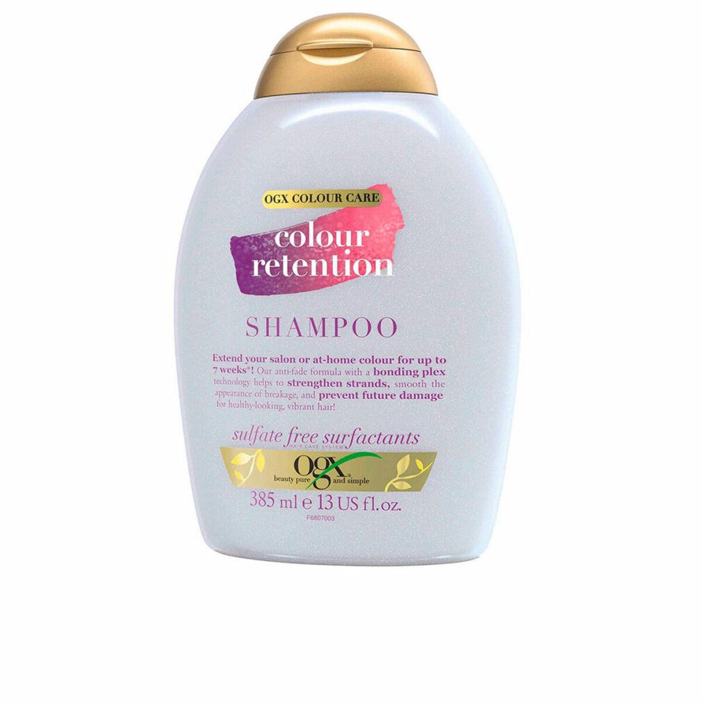 Flasche Shampoo, weiß, goldener Deckel. Aufschrift: OGX Colour Retention Shampoo. Volumen: 385 ml.