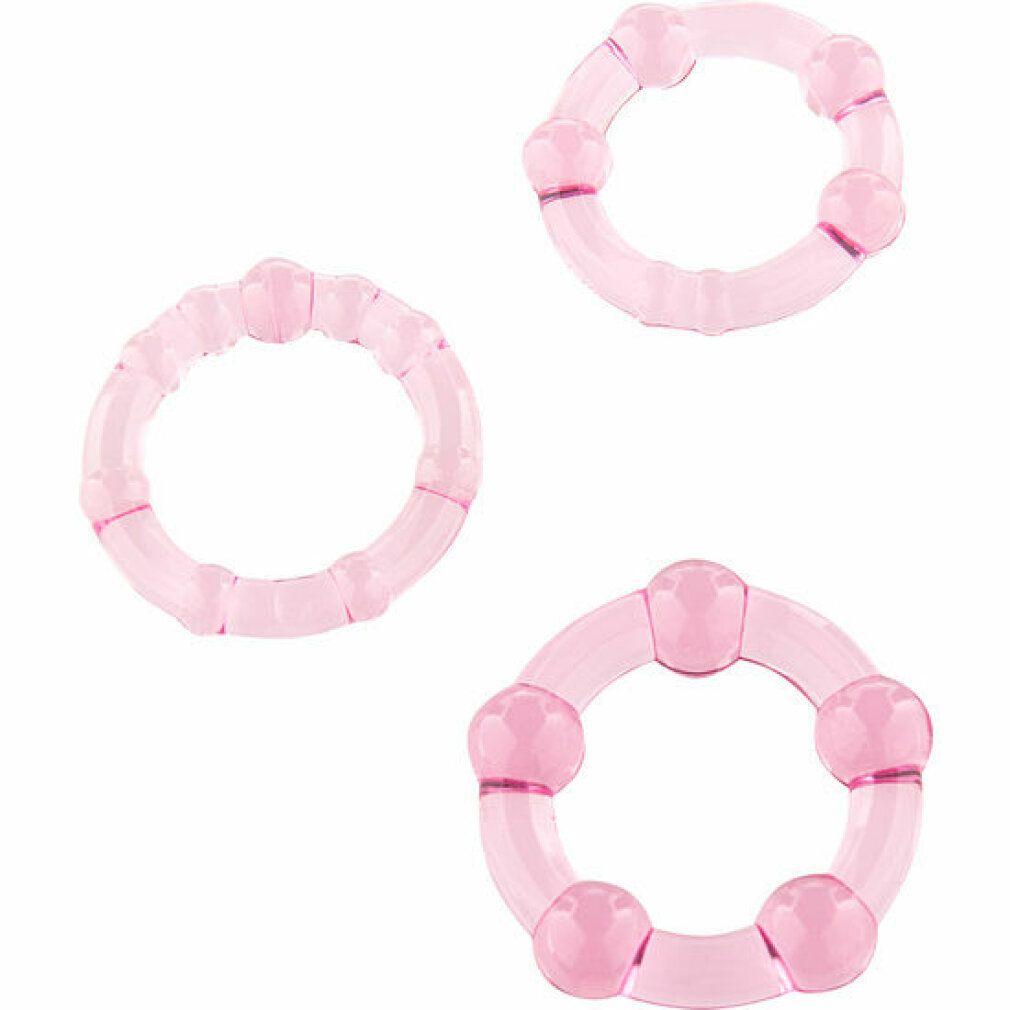 Drei rosa Penisringe. Unterschiedliche Größen und Formen. Aus transparentem Material mit abgerundeten Elementen.