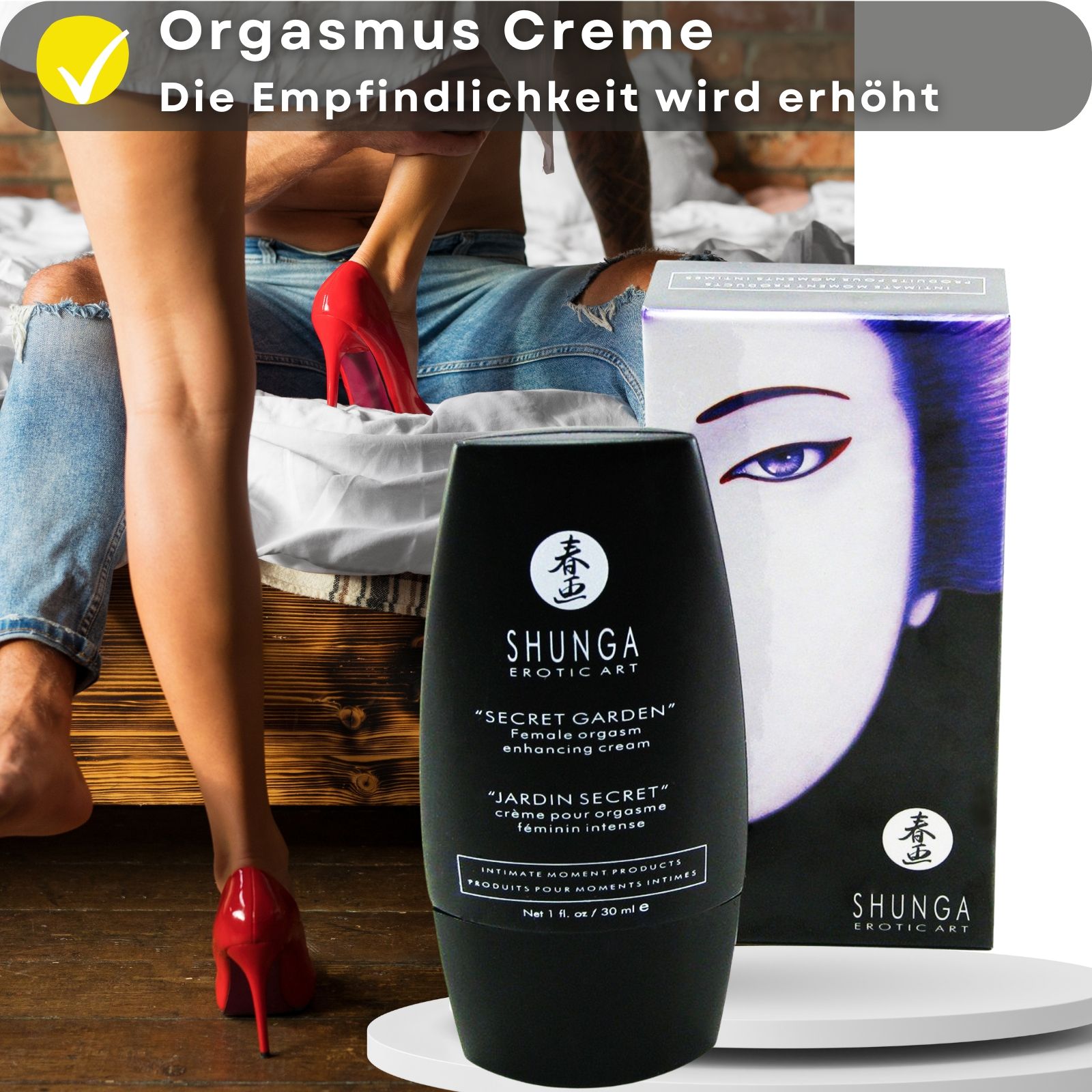 Produktflasche und Schachtel. Text in Deutsch. Produktname: Shunga. Paar im Hintergrund. Rote Schuhe.